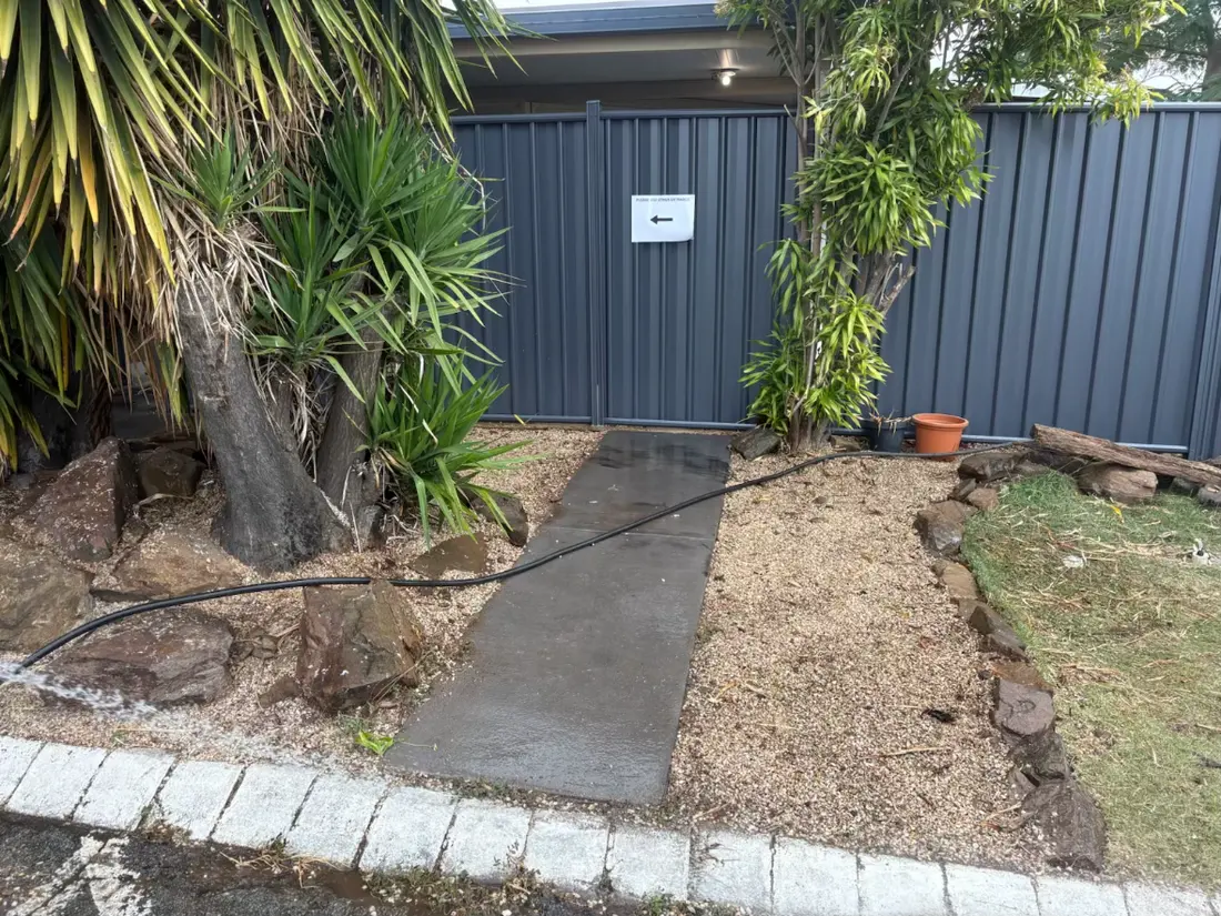 Finished garden bed with gravel and new turf